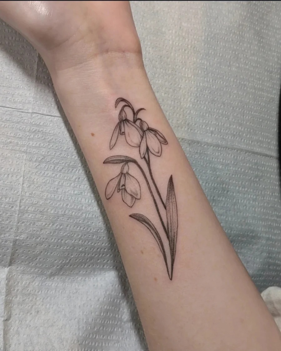 Elegant black ink snowdrop flower tattoo Tattoo Design