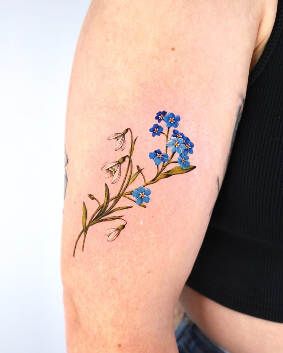 Elegant snowdrop and blue flower tattoo design Tattoo Design