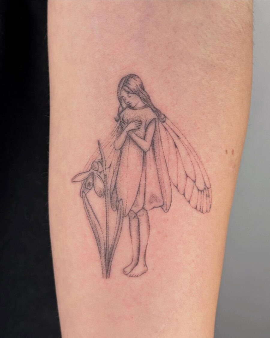Elegant snowdrop fairy tattoo design inspiration Tattoo Design