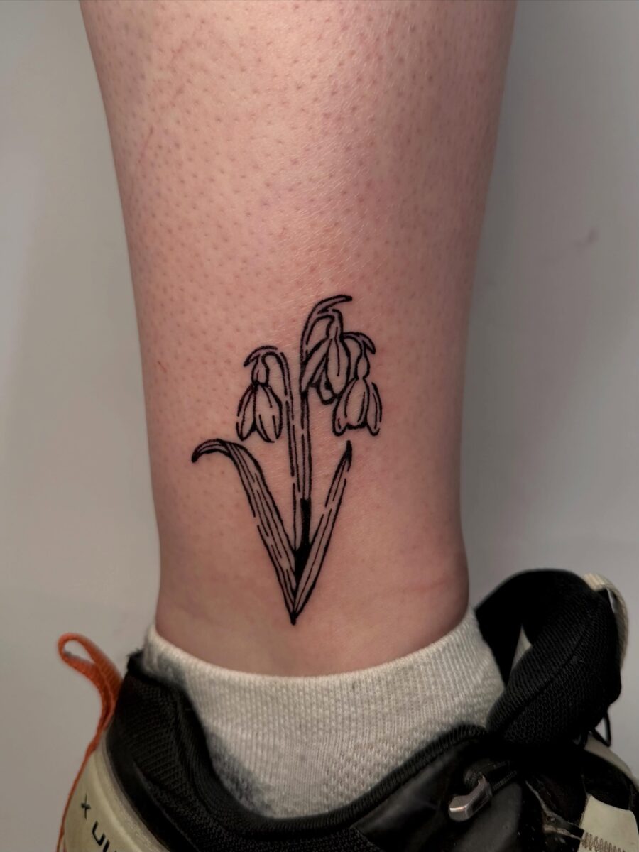Elegant snowdrop flower tattoo on the ankle Tattoo Design