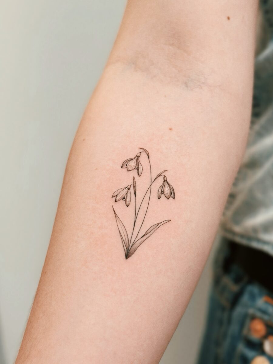 Elegant snowdrop tattoo for nature lovers Tattoo Design