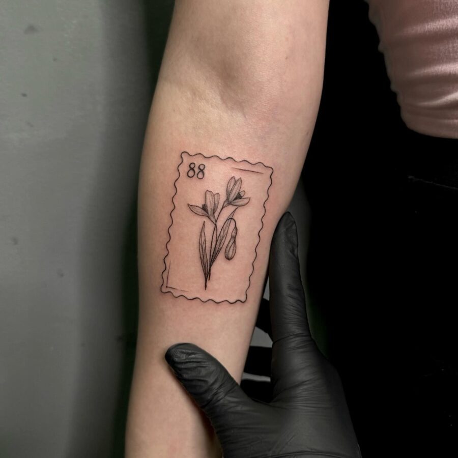 Elegant snowdrop tattoo in stamp design Tattoo Design