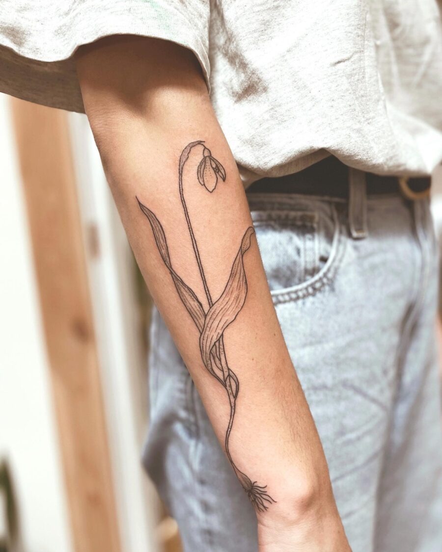 Elegant snowdrop tattoo on forearm Tattoo Design