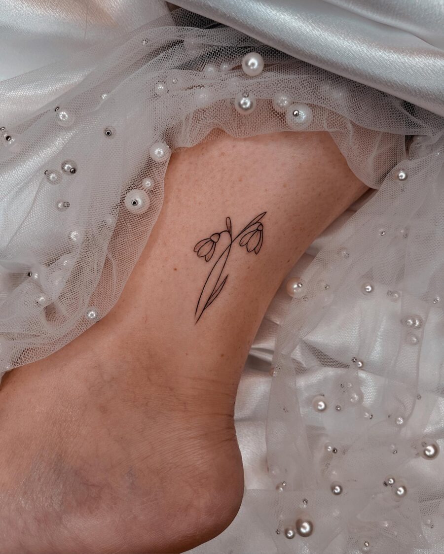 Elegant snowdrop tattoo on the ankle Tattoo Design