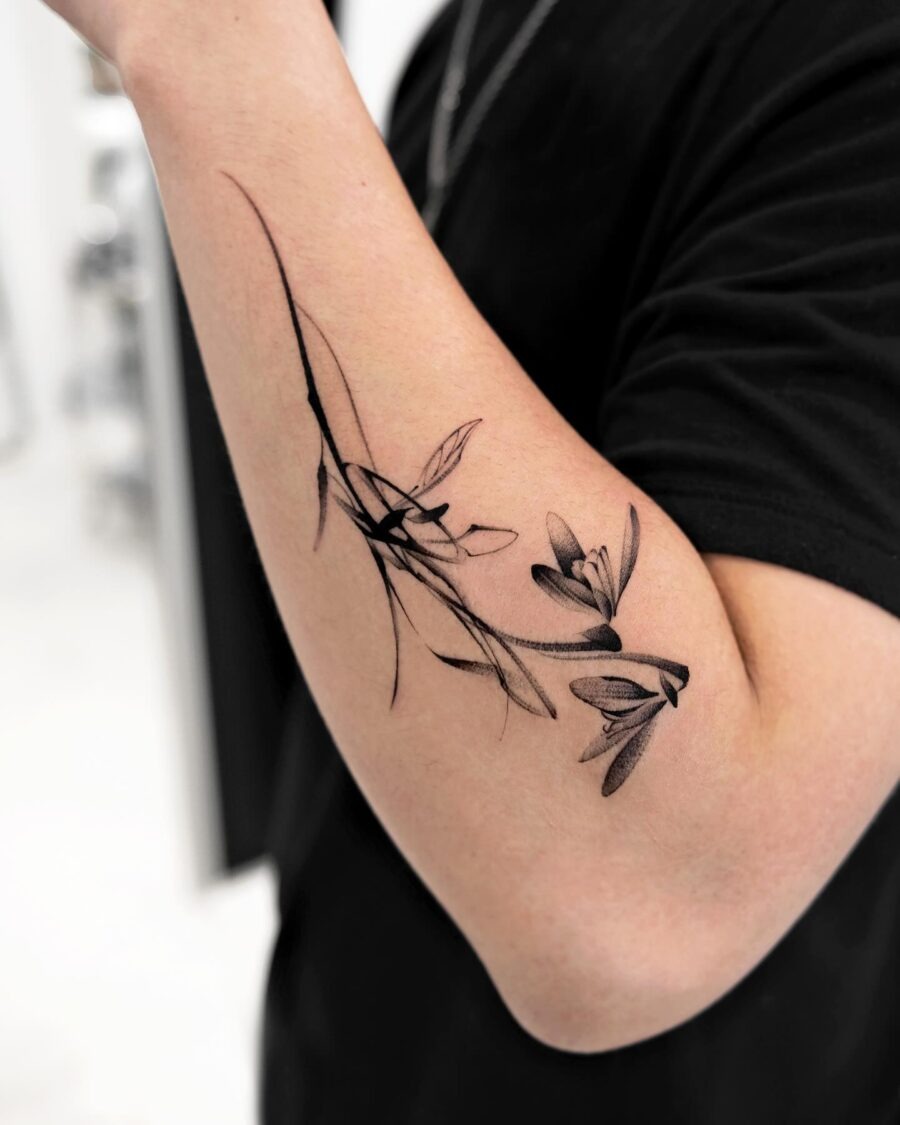 Elegant snowdrop tattoo showcasing delicate artistry Tattoo Design