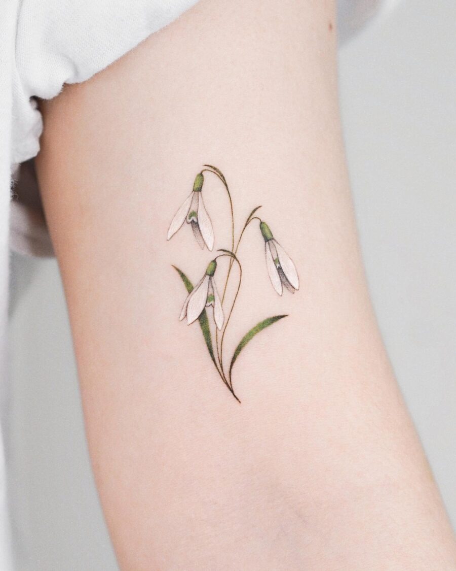 Elegant snowdrop tattoo showcasing soft colors Tattoo Design