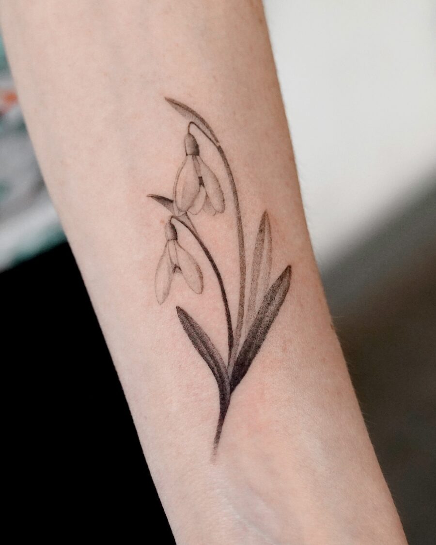 Elegant snowdrop tattoo with delicate details Tattoo Design