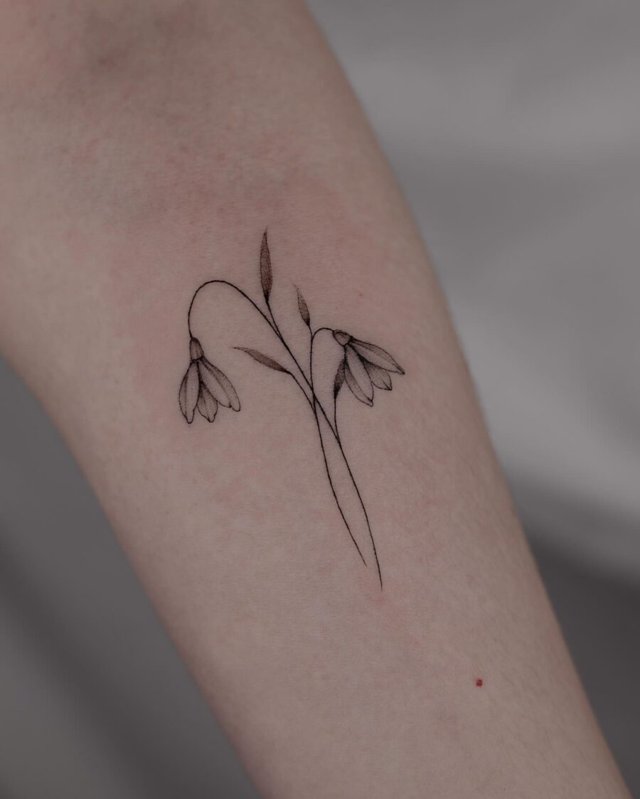 Elegant snowdrop tattoo with fine detailing Tattoo Design