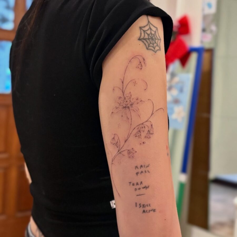 Feminine snowdrop flower tattoo with delicate details Tattoo Design