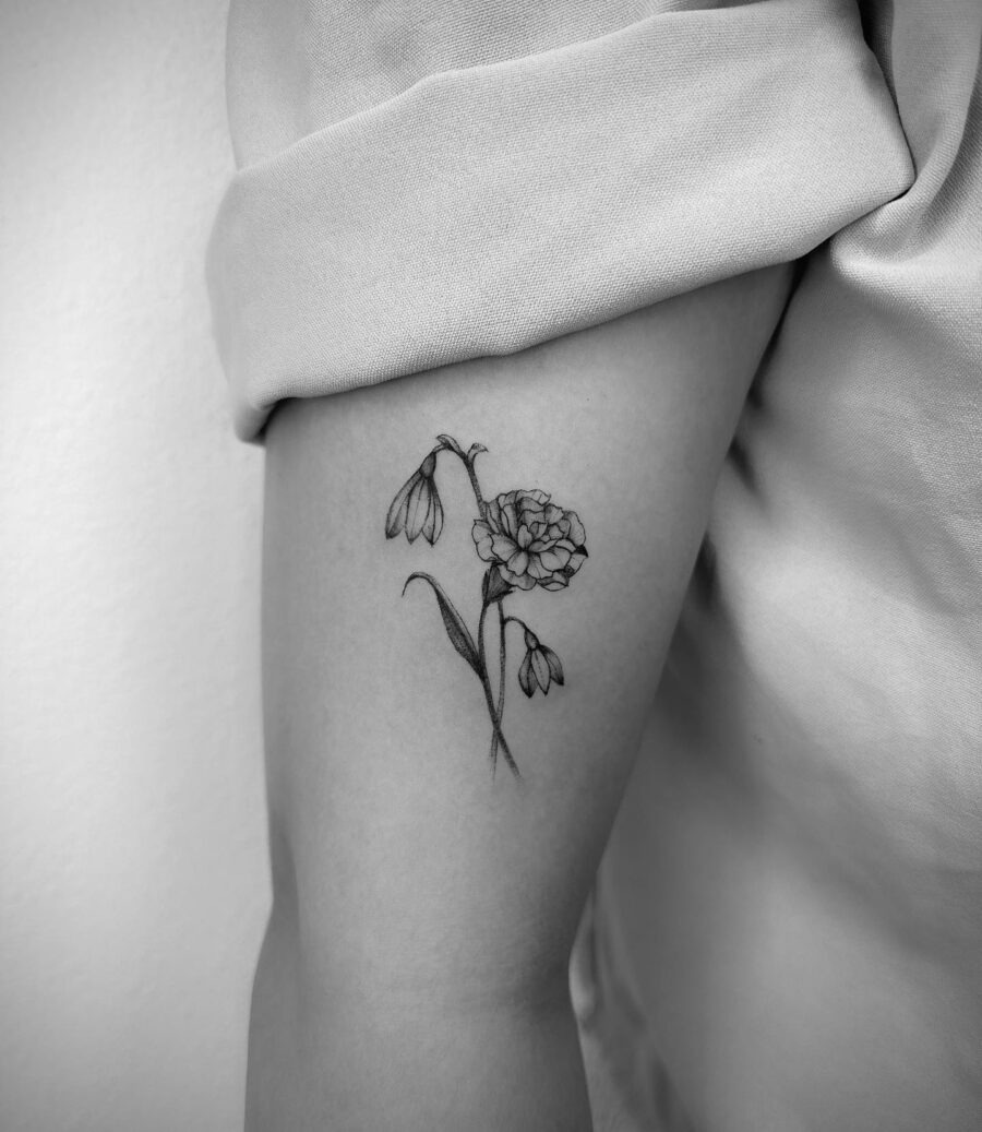 Stunning snowdrop flower tattoo on the arm Tattoo Design