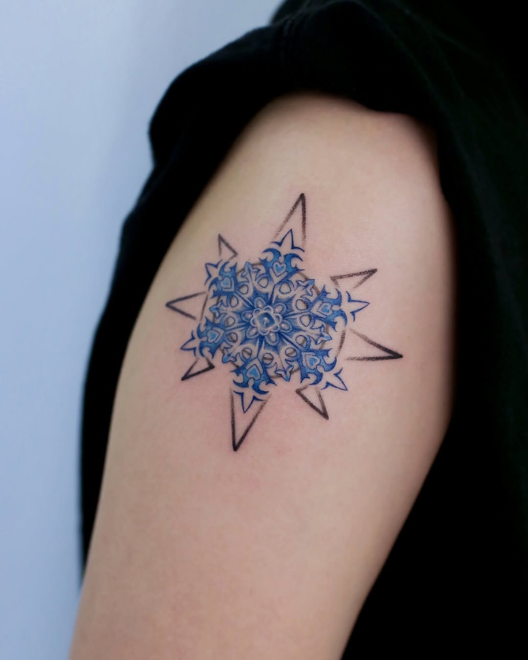 A stunning snowflake tattoo with intricate details Tattoo Design