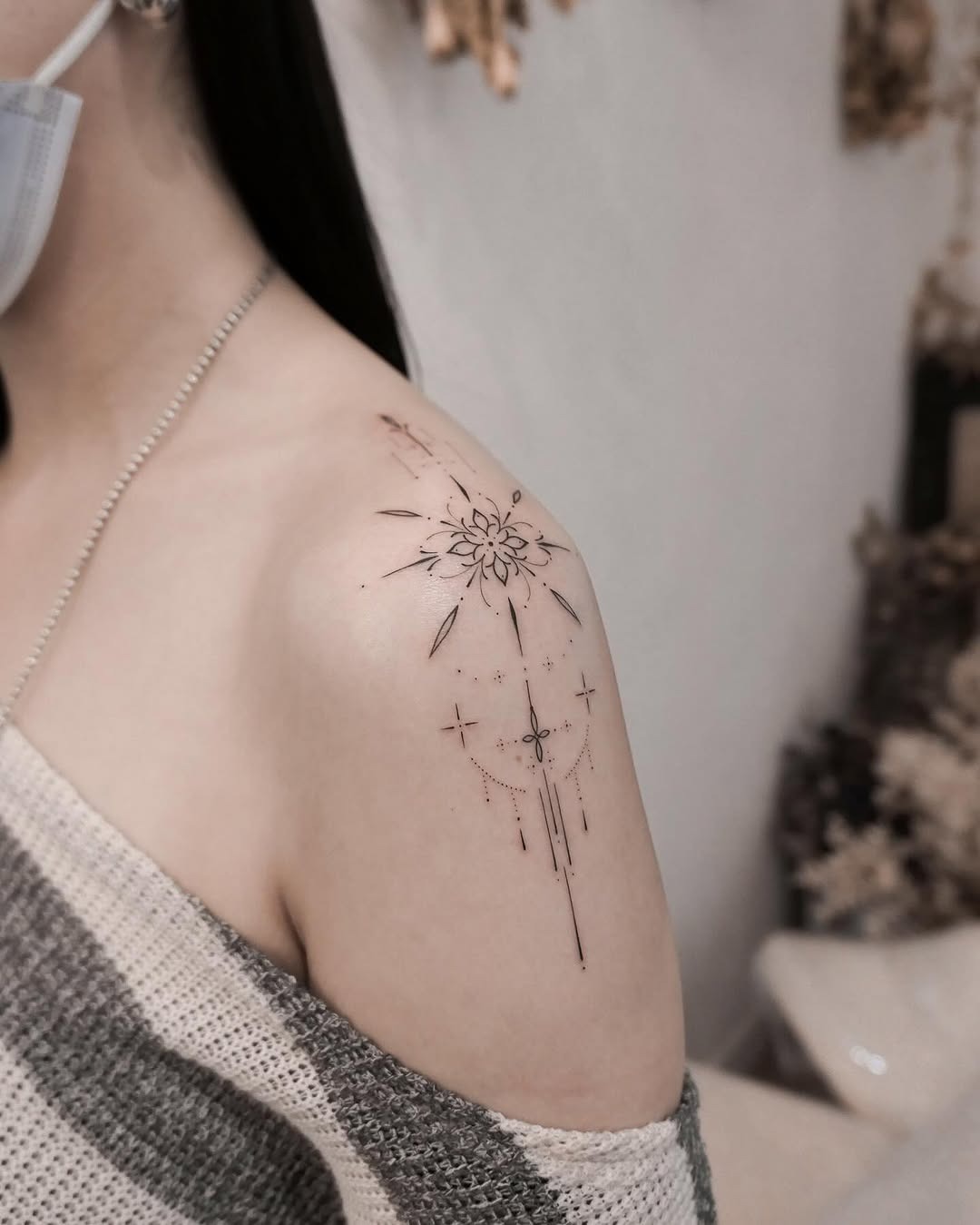 Delicate snowflake design on shoulder tattoo Tattoo Design