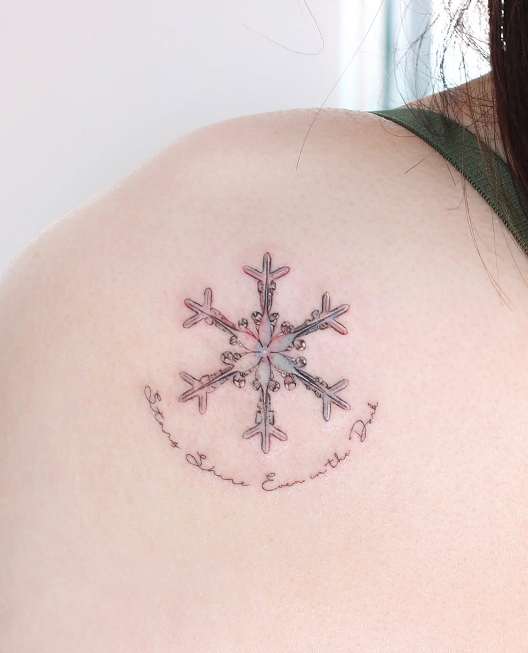 Elegant snowflake tattoo with delicate detailing Tattoo Design