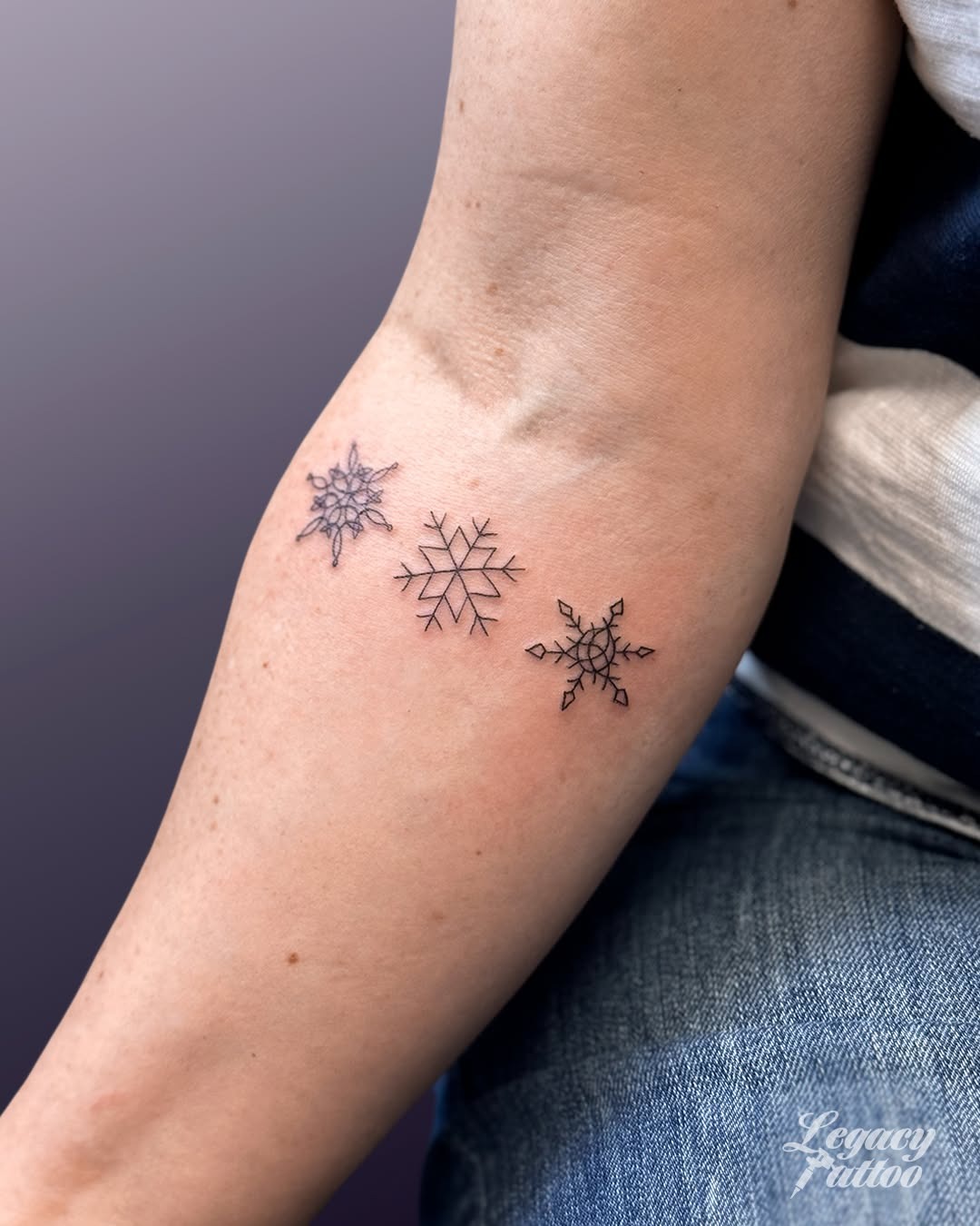 Elegant snowflake tattoos showcasing unique designs Tattoo Design