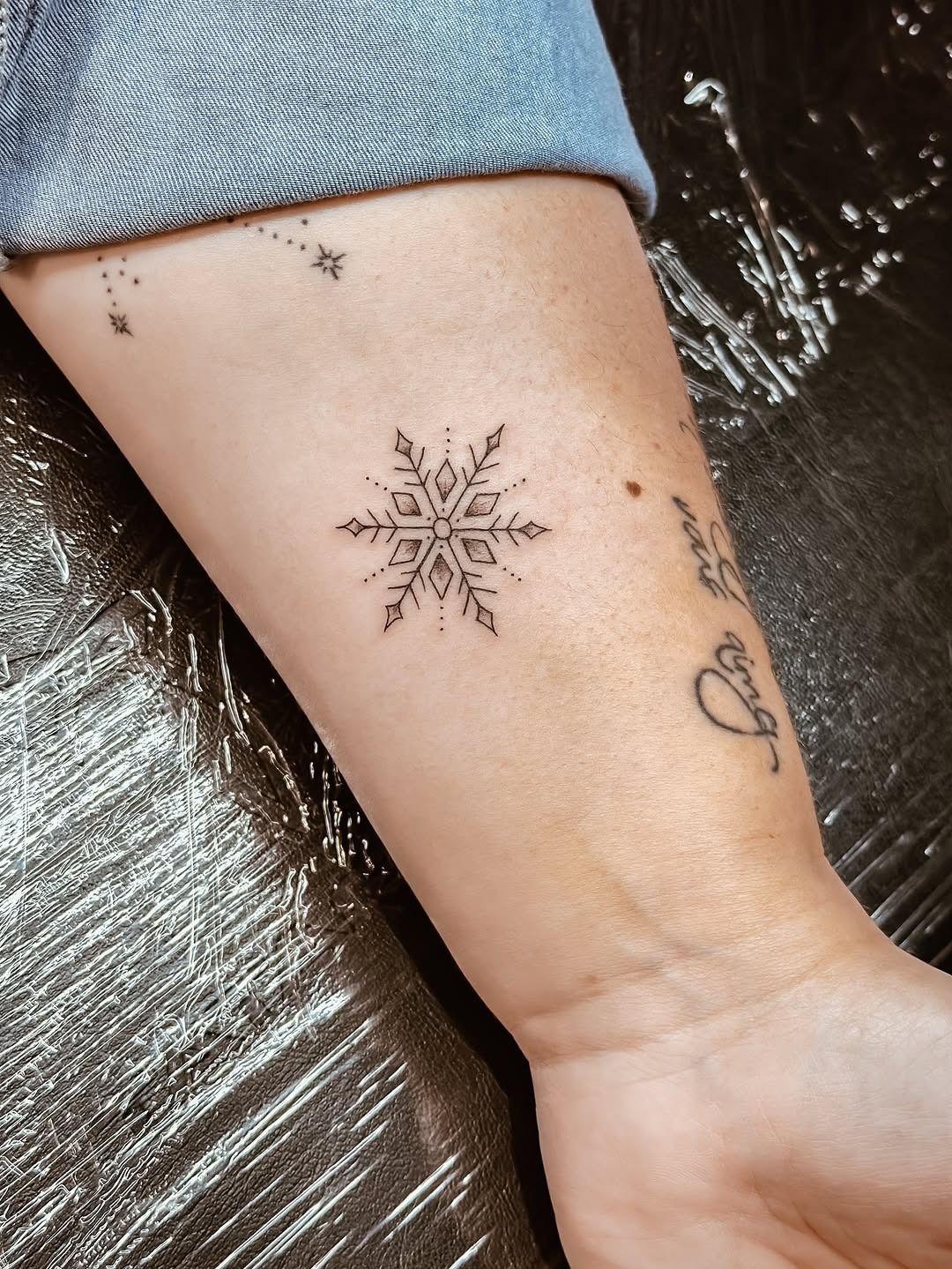 Exquisite minimalist snowflake tattoo design Tattoo Design