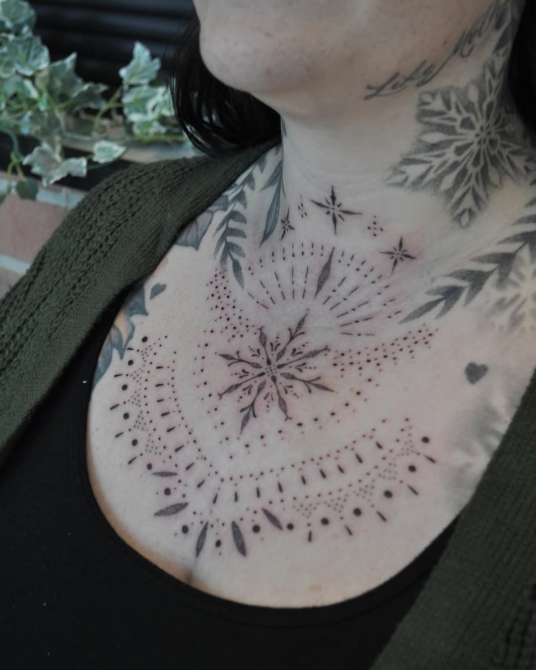 Intricate snowflake tattoo with delicate patterns Tattoo Design