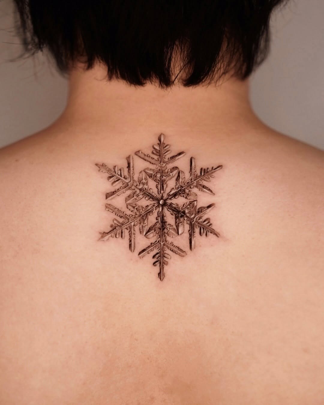 Stunning intricate snowflake tattoo design Tattoo Design