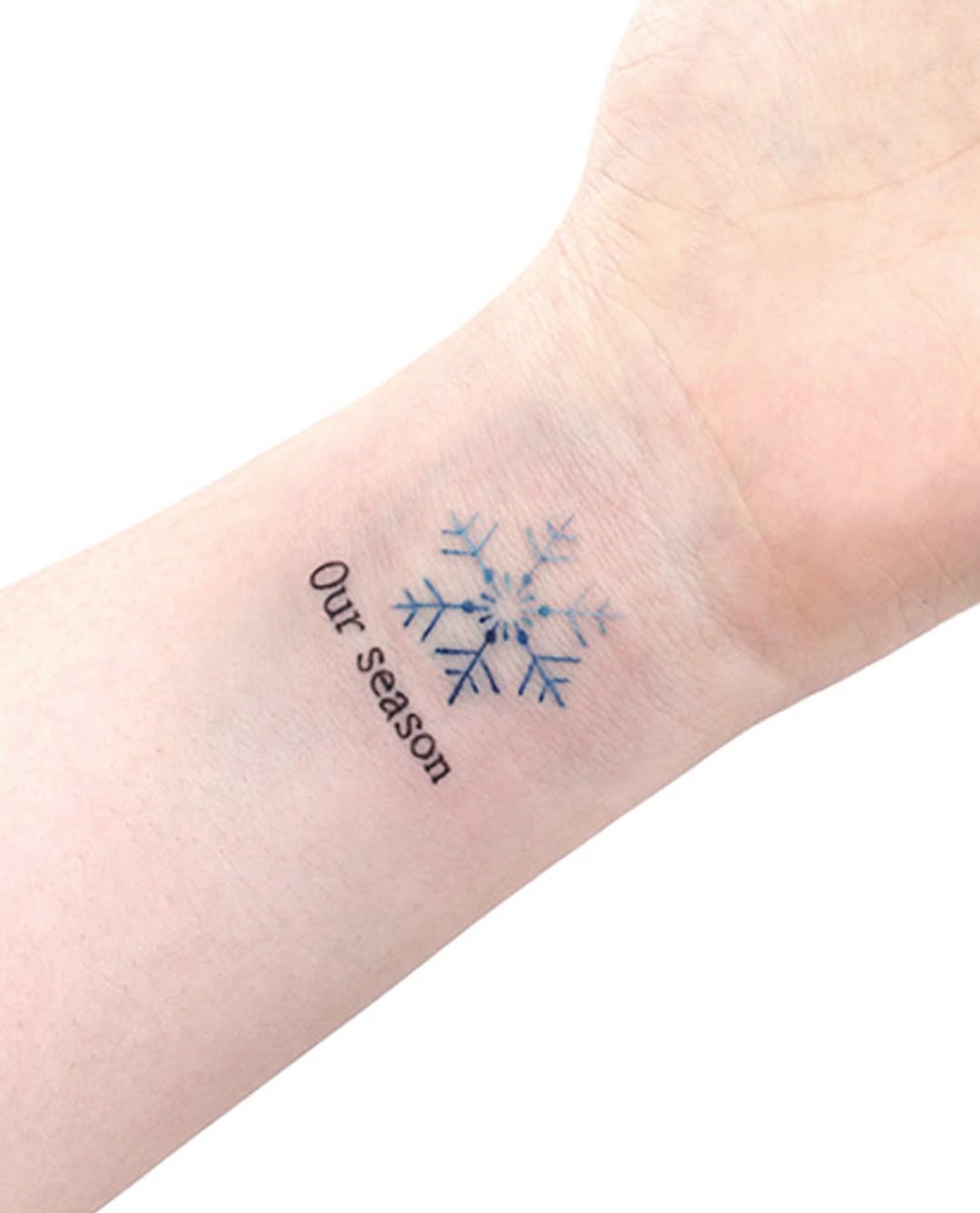 Stylish snowflake tattoo for winter vibes Tattoo Design