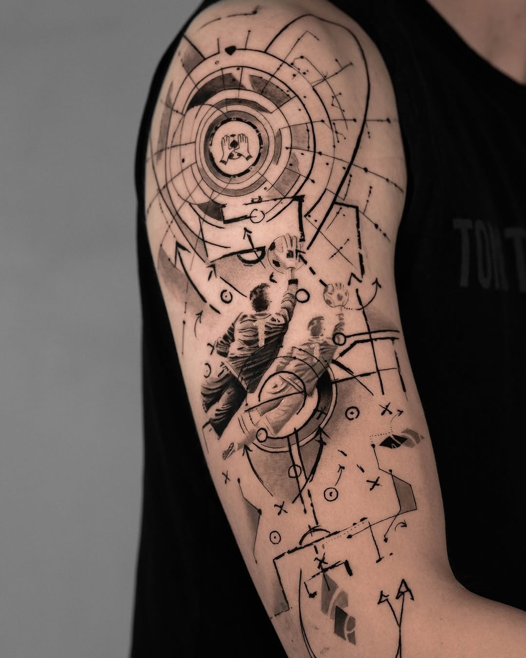 Dynamic soccer-themed tattoo with intricate designs Tattoo Design