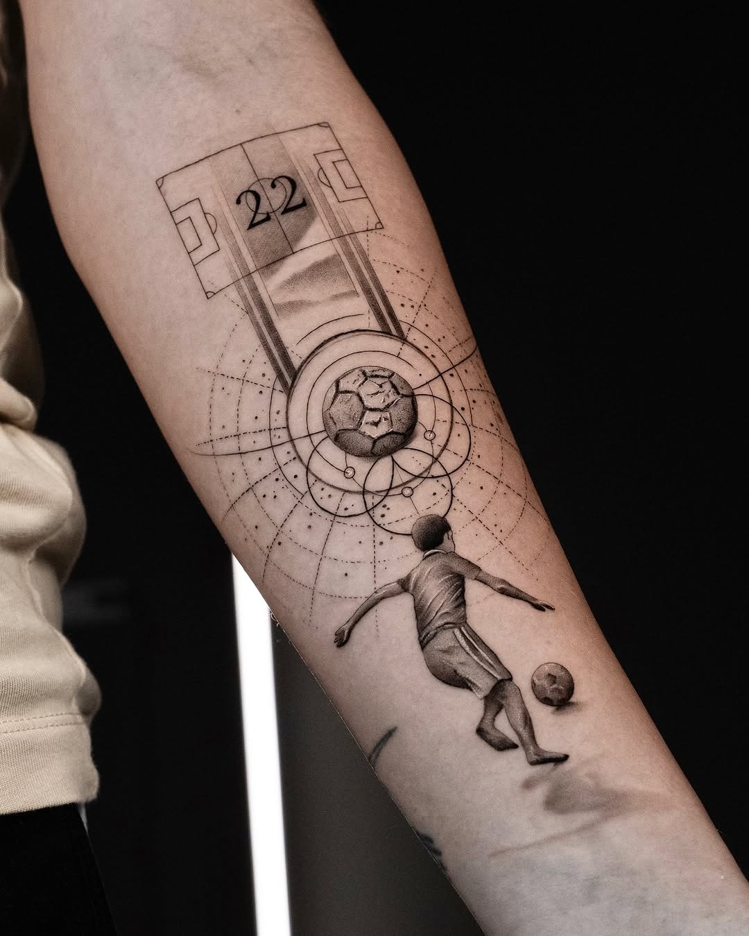 Elegant soccer tattoo showcasing dynamic movement Tattoo Design
