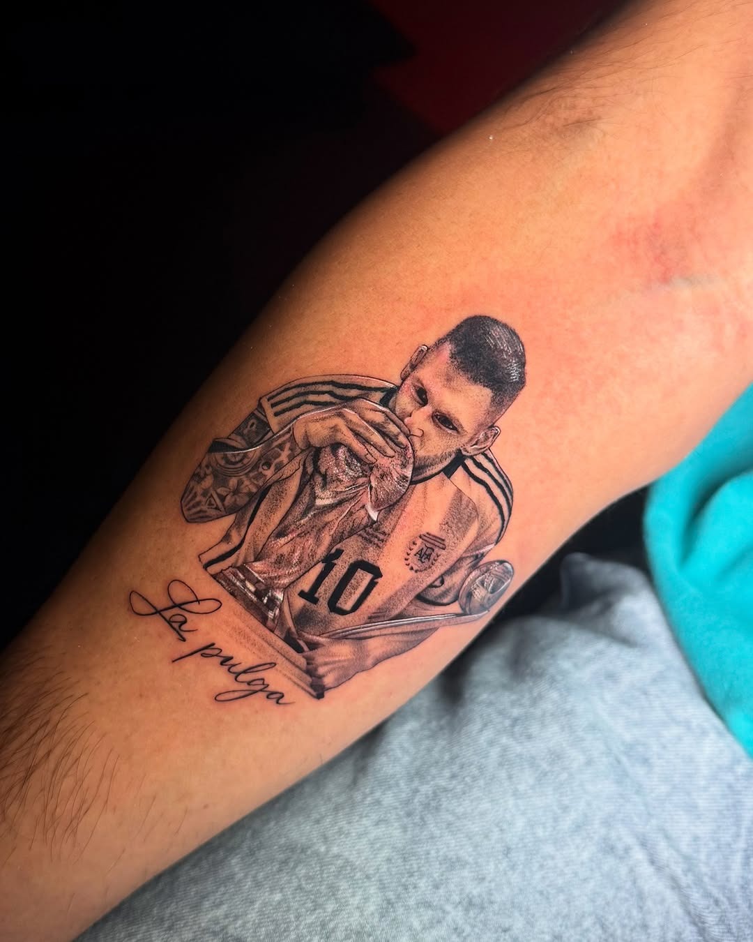 Lionel Messi celebrating victory inked on skin Tattoo Design