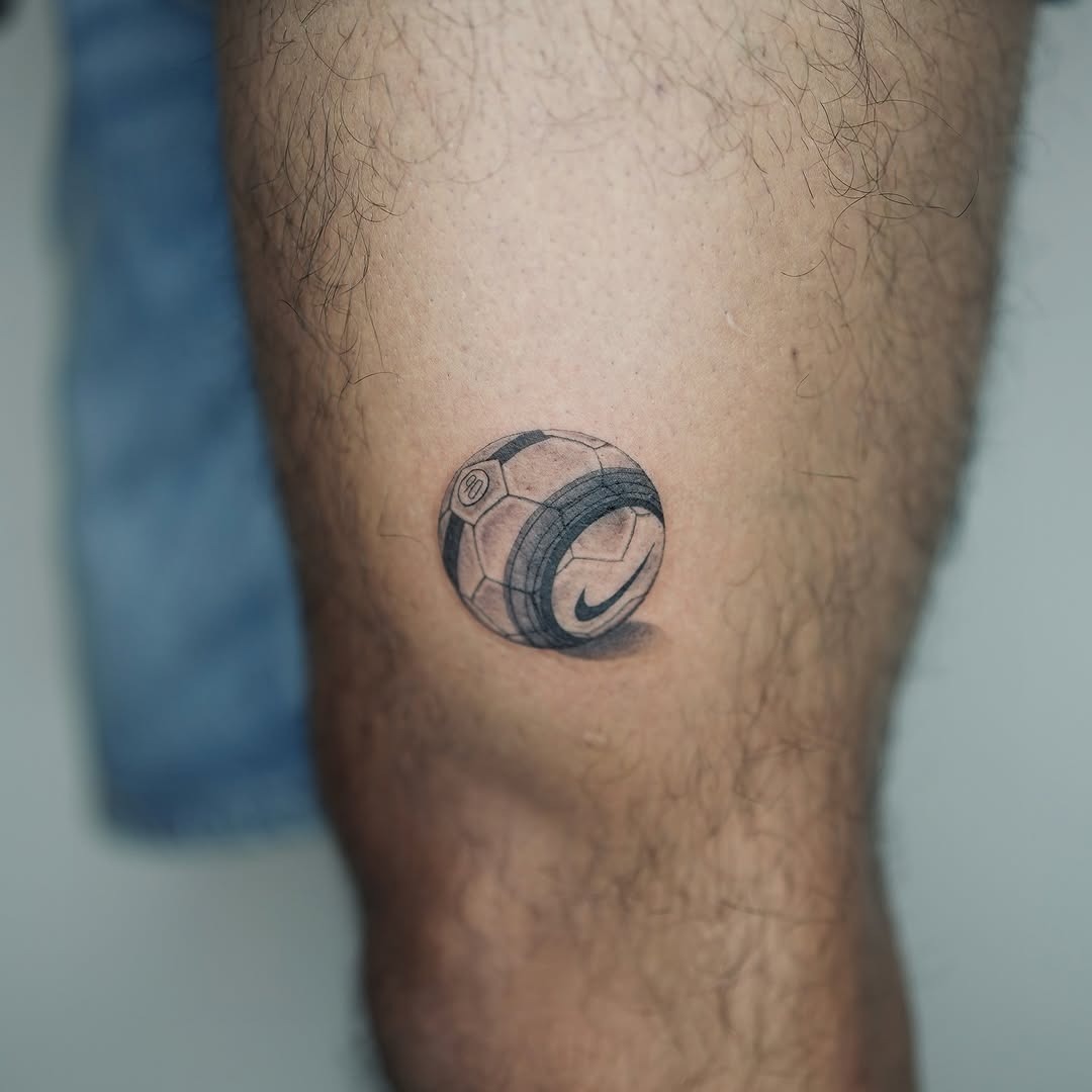 Realistic soccer ball tattoo on leg Tattoo Design