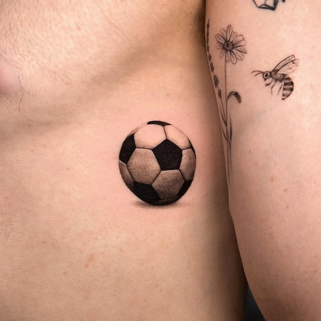Realistic Soccer Ball Tattoo on Skin Tattoo Design