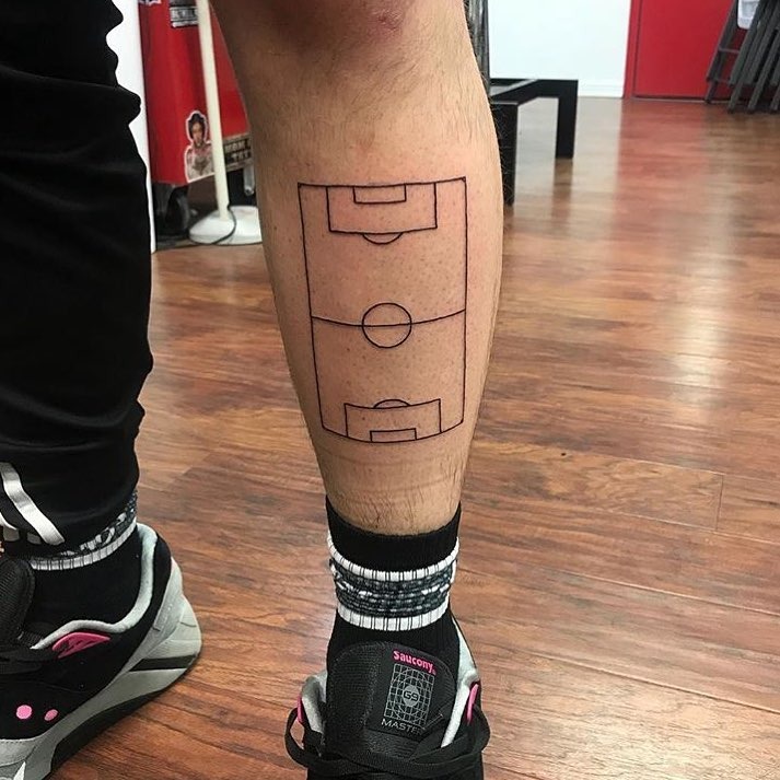 Unique soccer field tattoo on the leg Tattoo Design