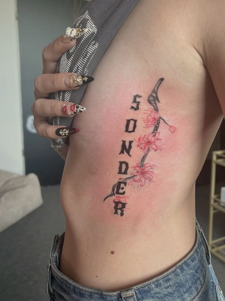 Floral Rib Sonder Design Tattoo Design