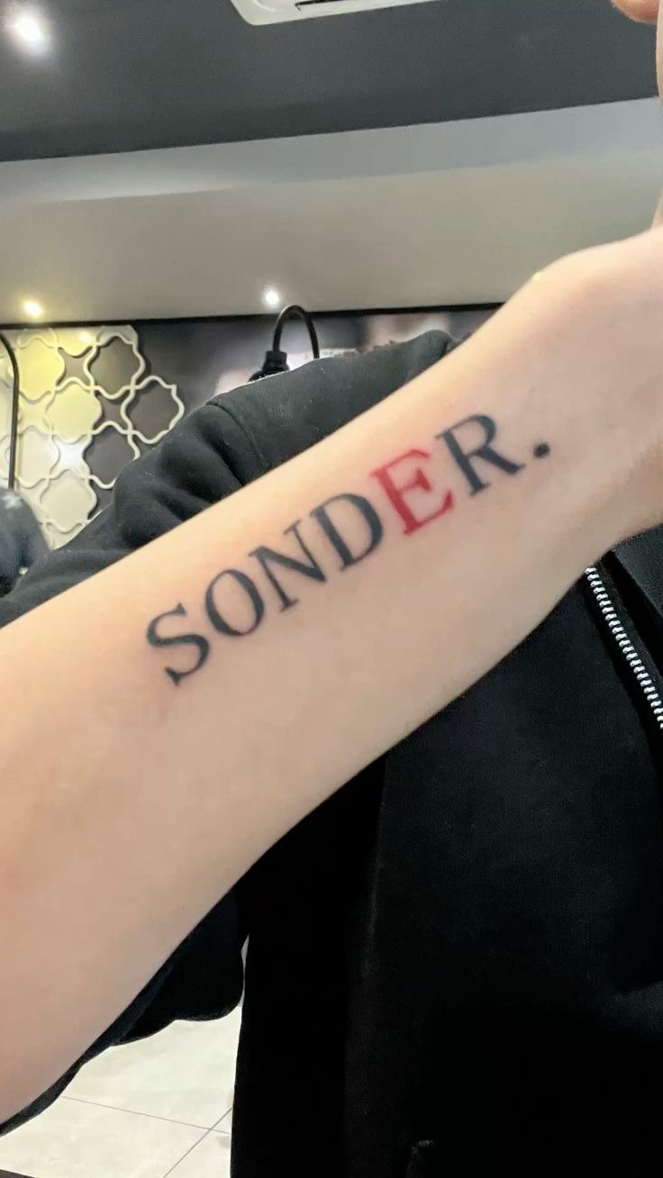Minimal Sonder Forearm Typography Tattoo Design