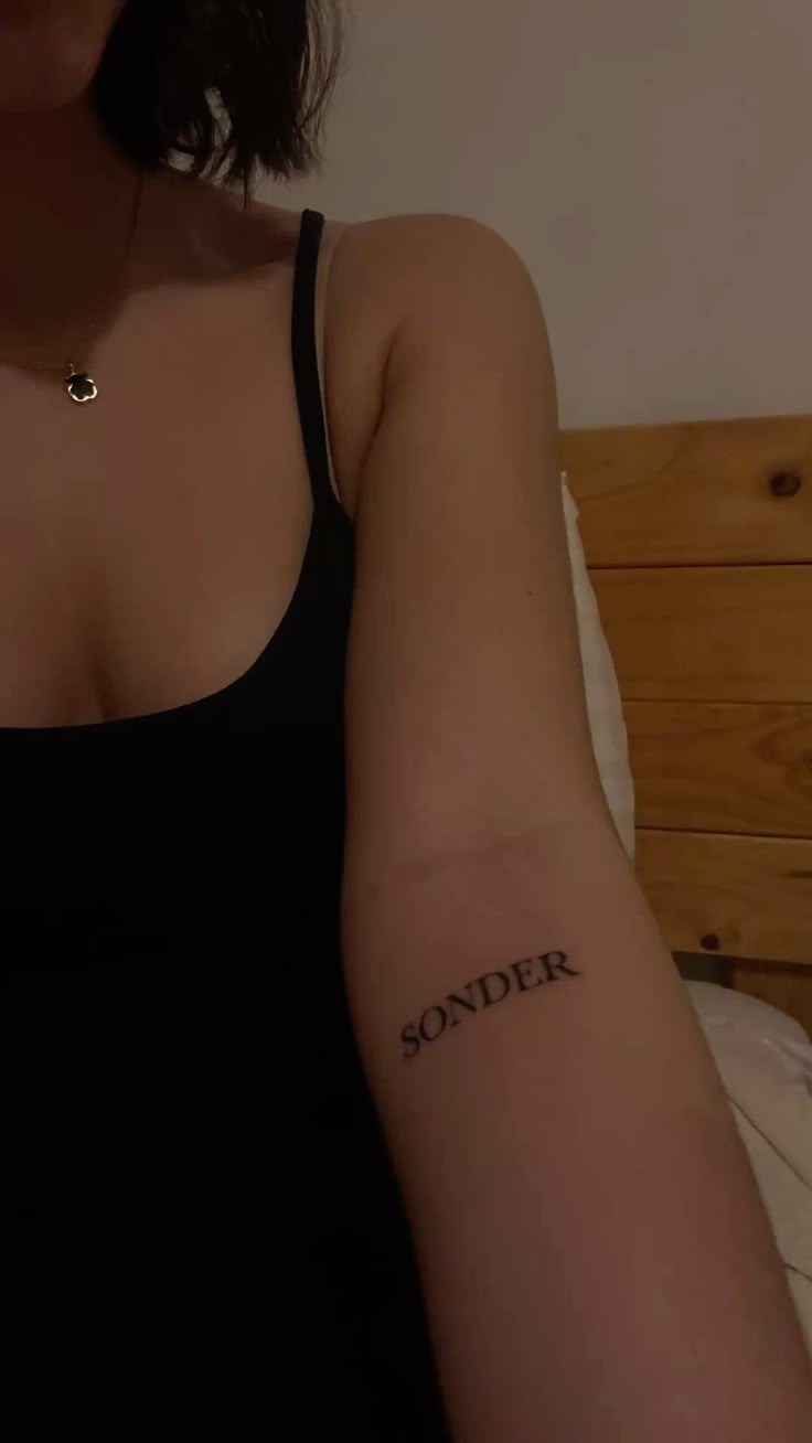 Red Sonder Shoulder Placement Tattoo Design