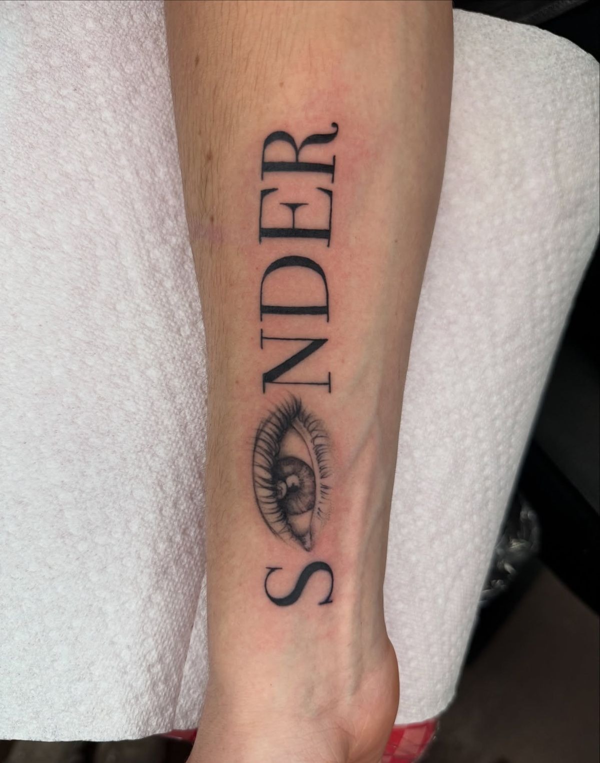 Sonder with Eye Symbol Forearm Design Tattoo Design