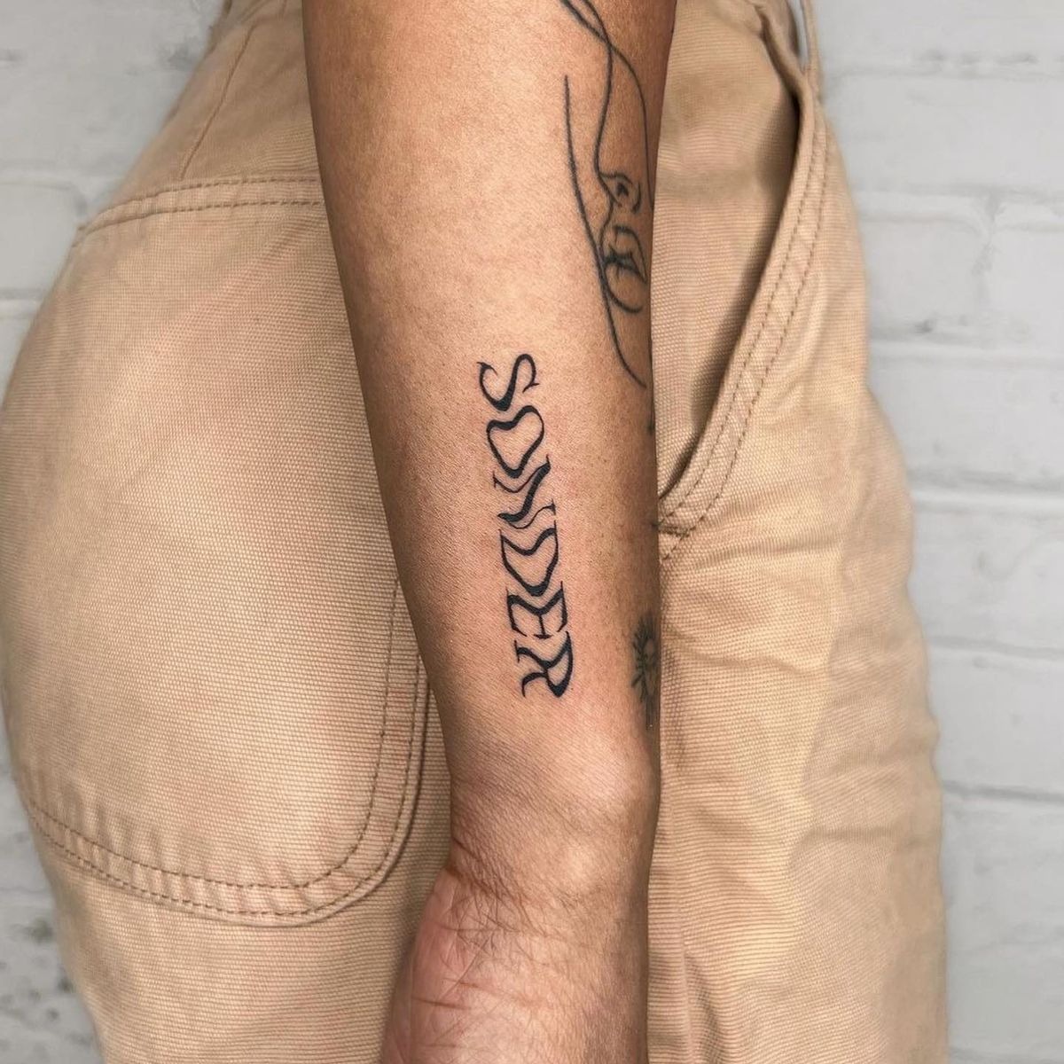 Vertical Sonder Inner Arm Design Tattoo Design