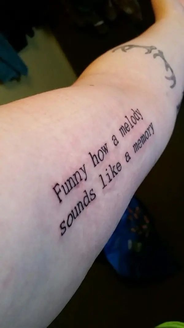 Hozier Chest Tattoo with Sharp Minimal Power Tattoo Design