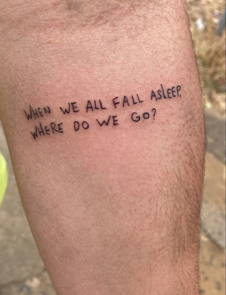 Minimal Inner Arm Lyric Tattoo with a Soft Question Tattoo Design