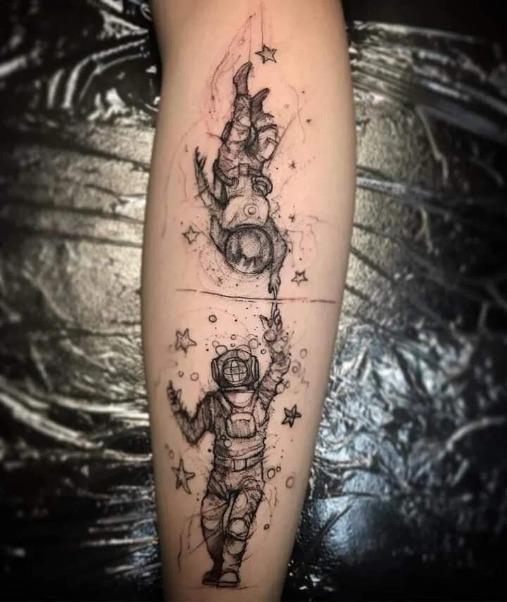 Astronaut Lifted by Planet Balloons Tattoo Design