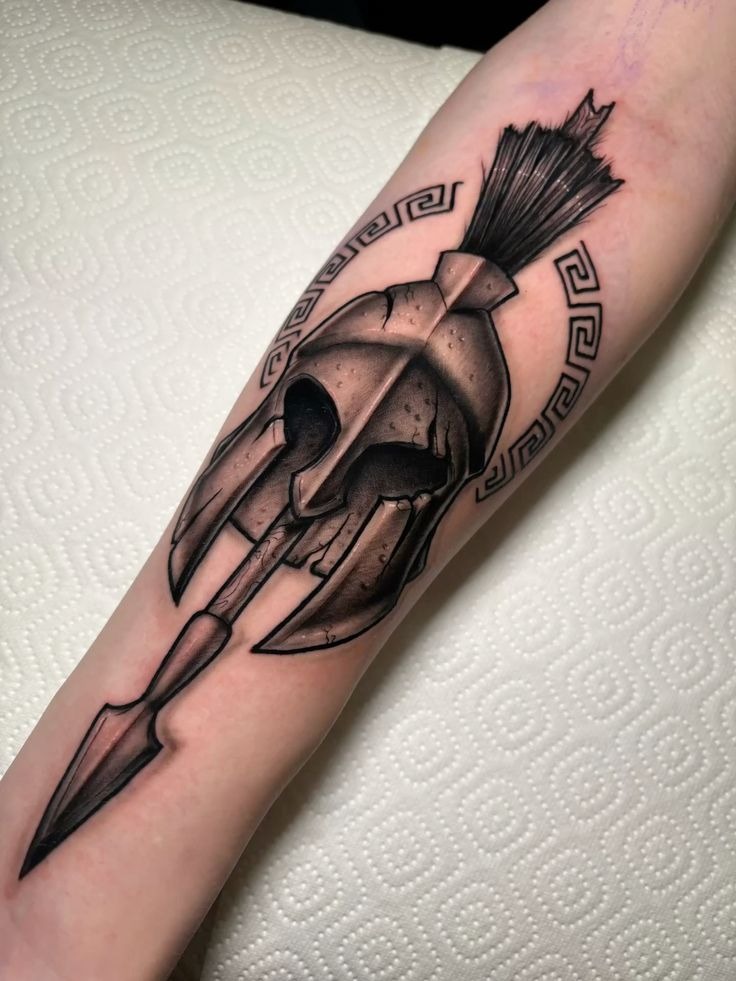 Spearhead Spartan Helm, a tattoo design rendered in clean detailed linework.