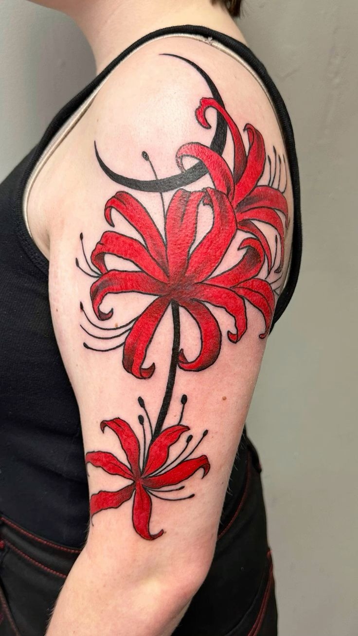 Bold Black and Red Upper Arm Blooms Tattoo Design
