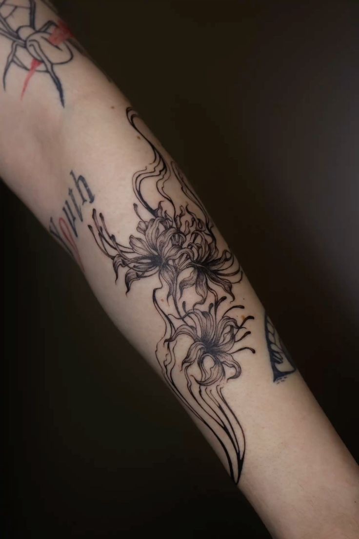 Wispy Black Spider Lilies on Forearm Tattoo Design