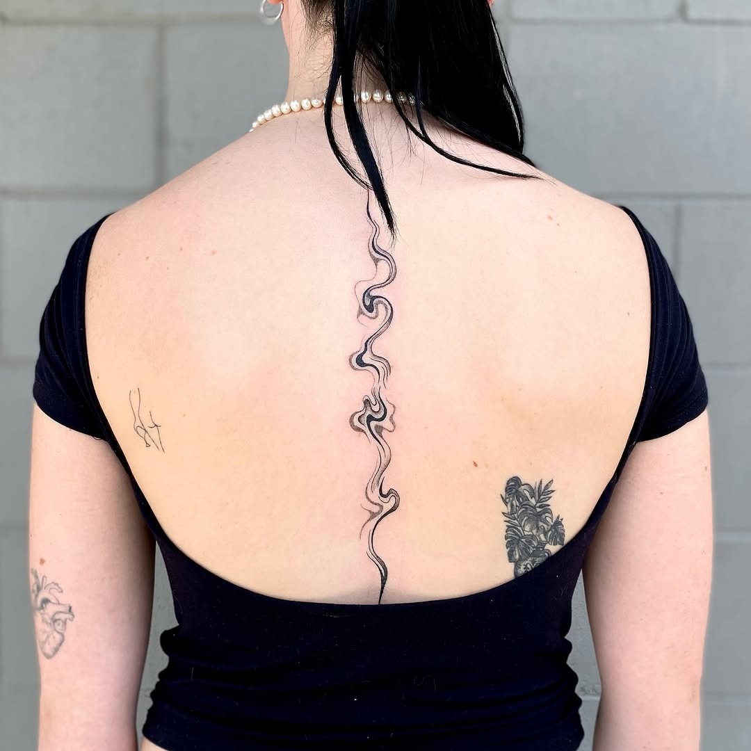 Elegant and Flowing Spine Tattoo Design Tattoo Design