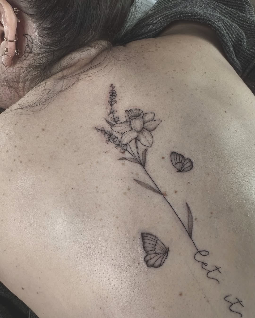 Elegant floral spine tattoo with butterflies Tattoo Design