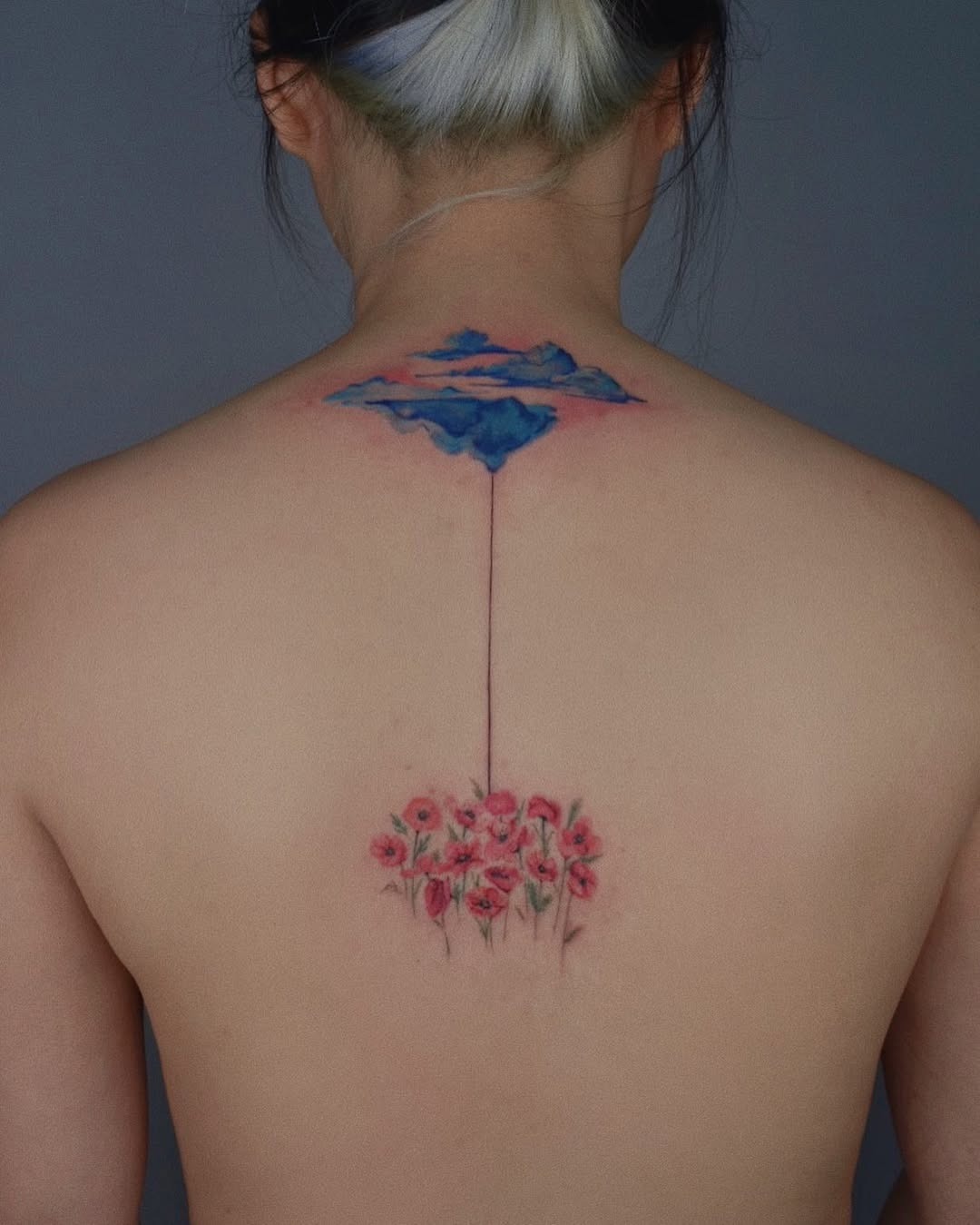 Vivid floral and cloud spine tattoo design Tattoo Design