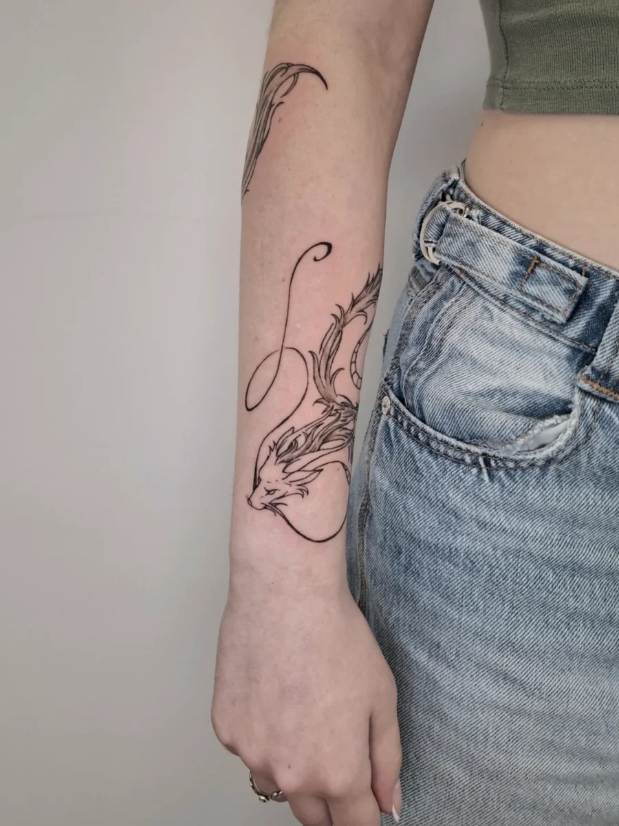 Elegant dragon tattoo inspired by Spirited Away Tattoo Design