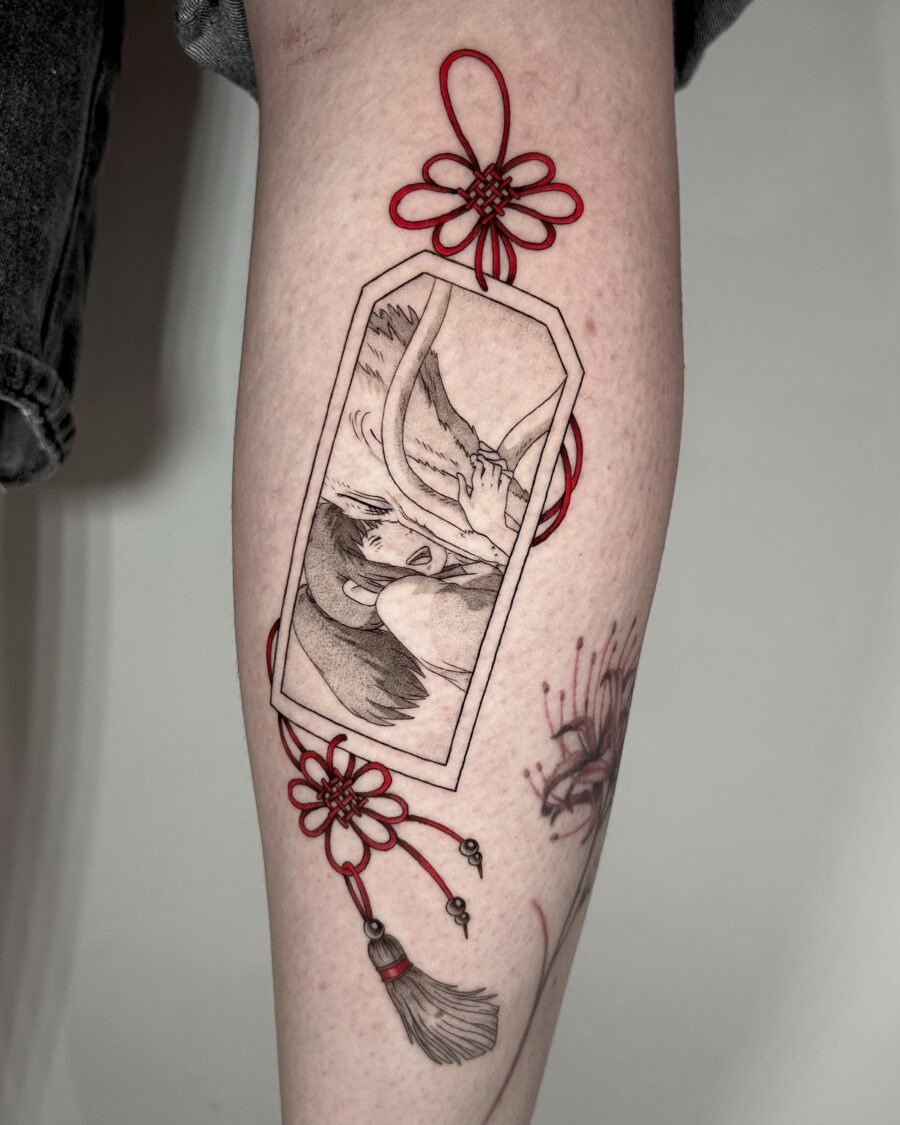 Intricate Spirited Away Tattoo with Floral Accents Tattoo Design