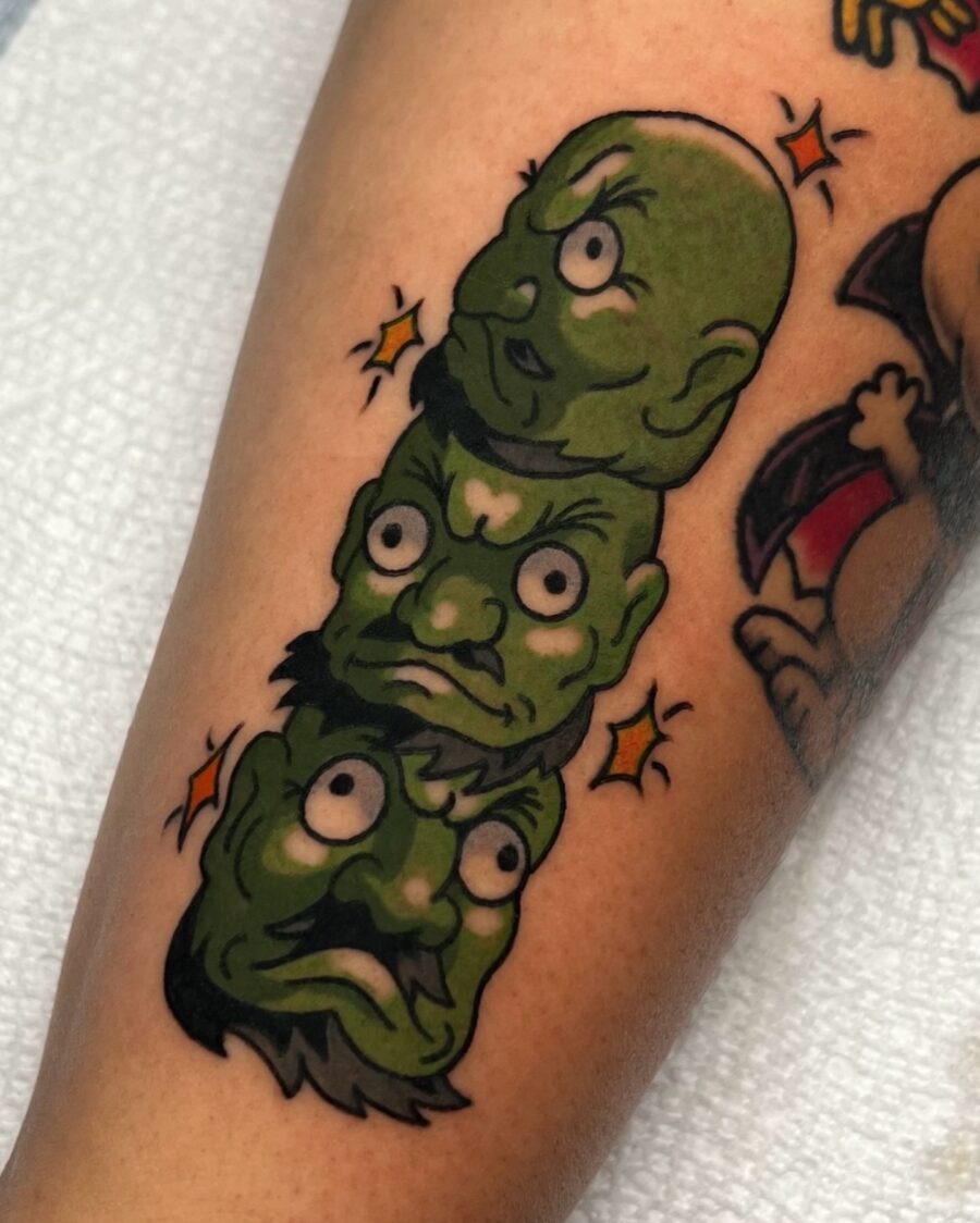 Unique depiction of green faces from Spirited Away Tattoo Design