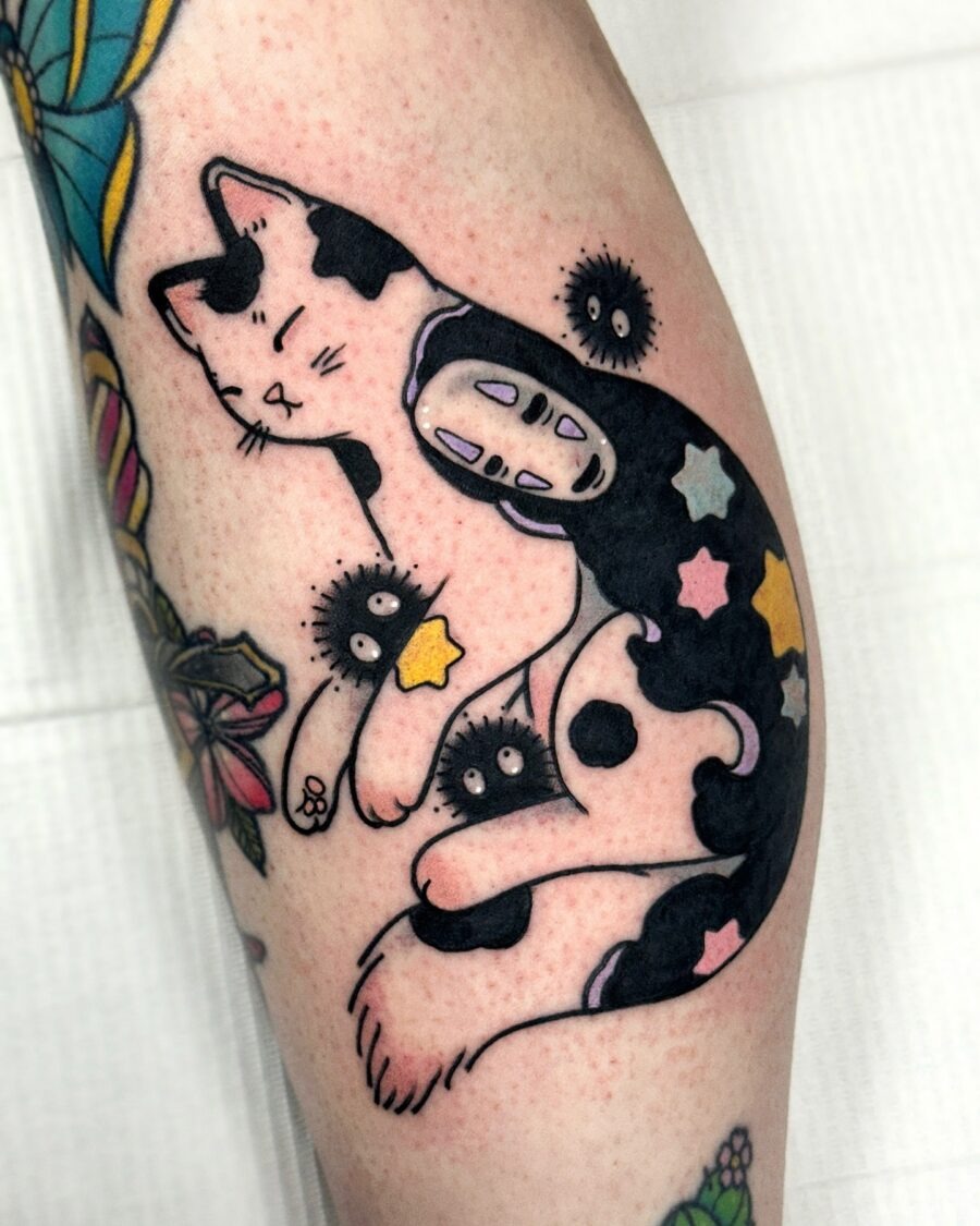 Whimsical black cat tattoo from Spirited Away Tattoo Design