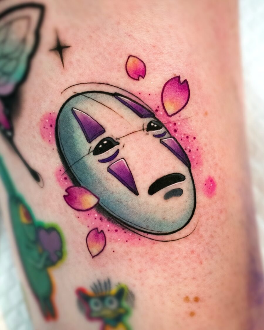 Whimsical No-Face Tattoo with Floral Accents Tattoo Design
