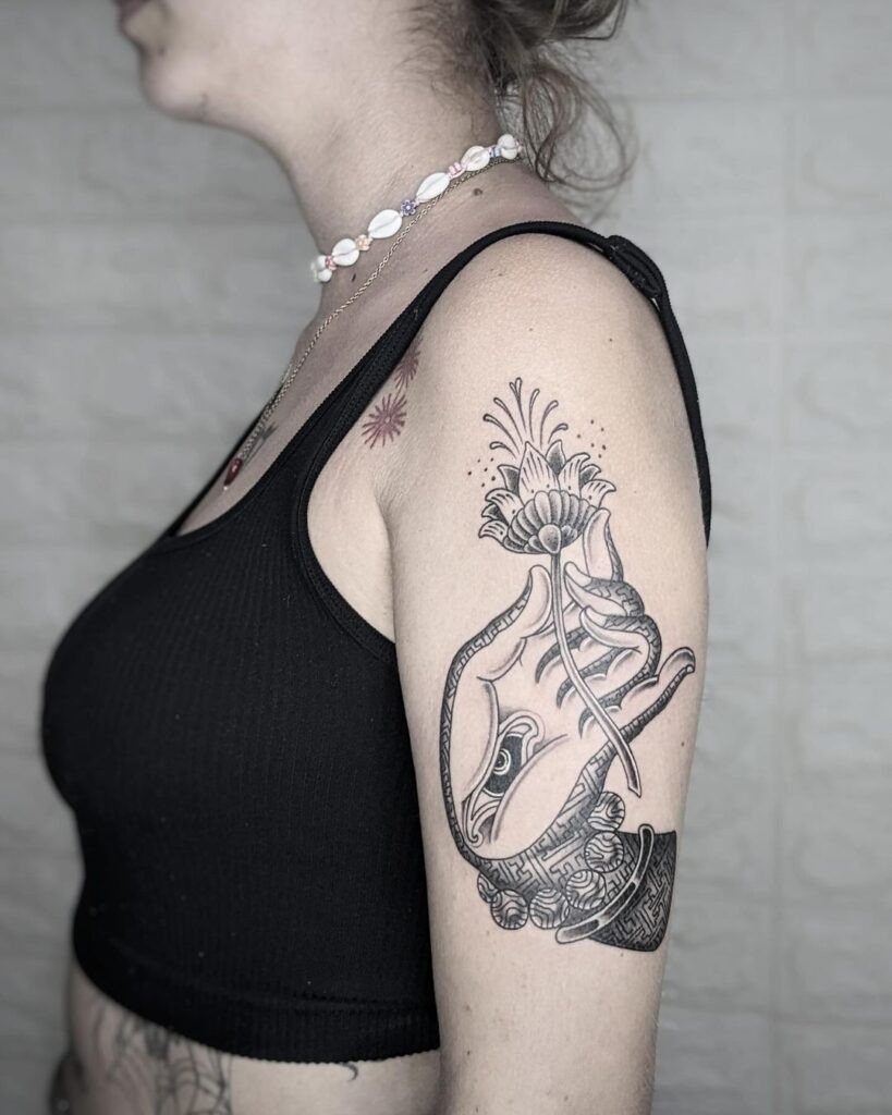 Hand and Flower Tattoo Design Tattoo Design