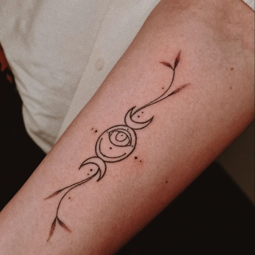 Minimalist Eye and Moon Tattoo Design