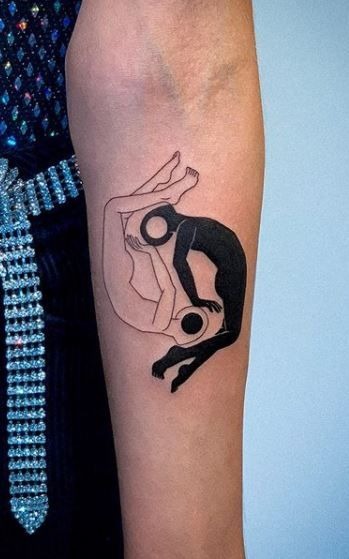 Yin-Yang Dual Figure Tattoo on Forearm Tattoo Design